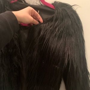 Black furry coat